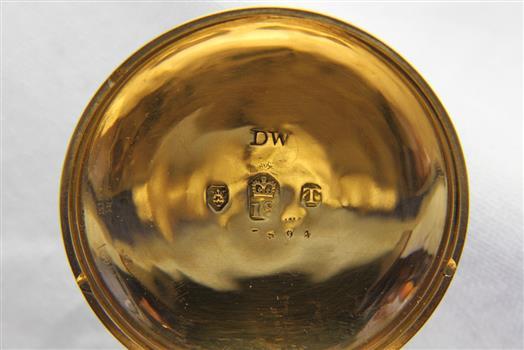 Marks inside the cover have numerals and text and symbols