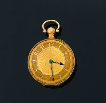 Upright gold pocket watch against a dark blue background