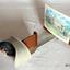 Wooden and metal stereoscope with clips to hold stereograph photographs