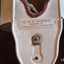 Close-up of the maker's plate and impressed details