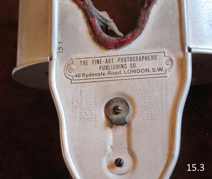 Close-up of the maker's plate and impressed details