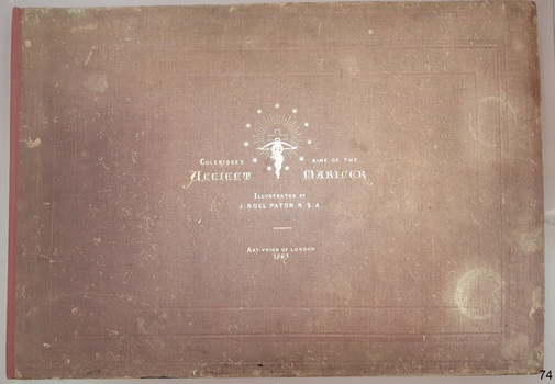 Burgandy textured cloth cover with embossed gold lettering and images