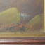 Painted using red-brown paint, in capital letters “W. LANGLEY-TAYLOR.”