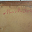 Handwritten in thick red crayon or pencil, in script “Mrs M Irby”.