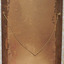 Handwritten inscriptions are sideways along the lower left edge of the painting’s board, red writing left of the pencil writing. 