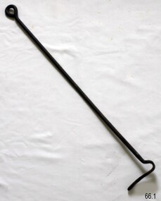 Long metal bar with a loop in one end and a hook formed on the other end