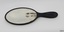 Oval mirror with black surround and handle