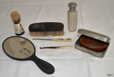 Eight grooming items displayed on a bench
