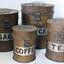 Four metal canisters in a group