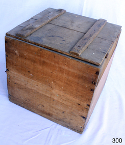 Handmade wooden box with hinged lid. Made from rough pine boards.