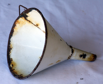  White enamel funnel with dark rusty metal edge around the top.