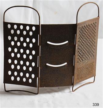 A metal grater with three hinged sides for grating different sizes and types of food.