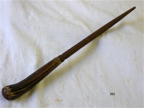 Sharpening steel with bone handle. Part of a carving set.