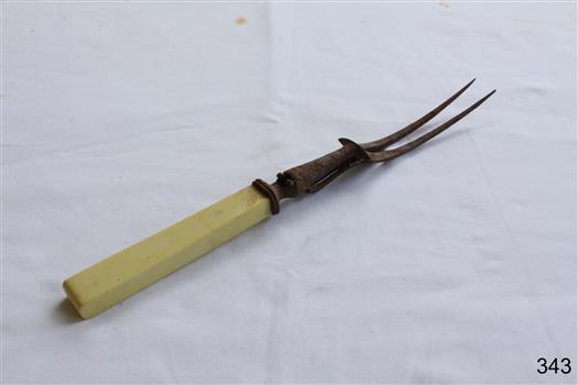 Metal carving or serving fork with bone handle