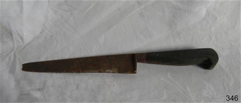 Metal kitchen knife with serrated edged blade and wooden handle