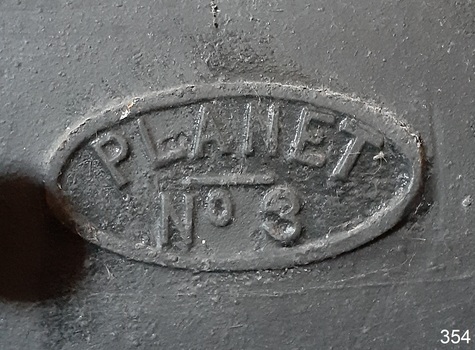 Maker's plate; text within an over border "PLANET NO. 3"