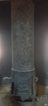 Flue with maker's plate in front and air control below the plate