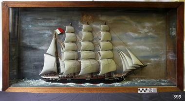 Diorama of a sailing ship in a glass-fronted timber case 