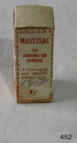 A gauze bandage inside a glass container, in a cardboard carton.