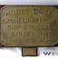 Mounted brass nameplate identifies ship builder and ship's number. Another plaque refers to the donor.