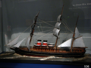 Three-masted ship with two steam funnels