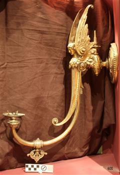 Lamp's left side, upright