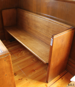 This pew butts against the south wall and is in the south-west corner.