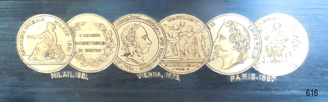 Another group of decals representing further exhibitions of the model of the organ