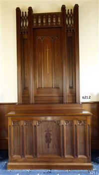 Polished wooden altar base and reredos or top panel, each with decorative finish