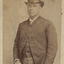 Man formally dressed with top hat, jacket and waistcoat