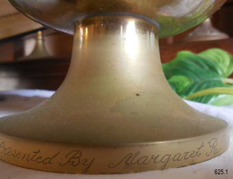 Inscriibed in script "Presented By Margaret R"