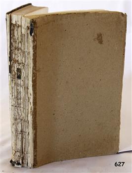Cover is cardboard with remnants of dark blue. The cover is missing from the spine, exposing the folded pages..