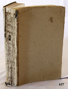 Cover is cardboard with remnants of dark blue. The cover is missing from the spine, exposing the folded pages..