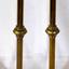 Pair of brass candlestick holders, brass, with scalloped edged wax cup, bulbous decoration on stem and round base