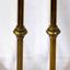 Pair of brass candlesticks, brass, with scalloped edged wax cup, bulbous decoration on stem and round base