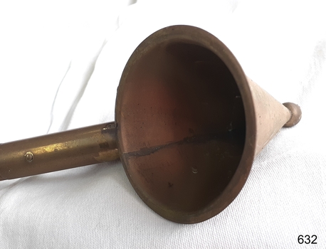 Metal cone-shaped snuffer with long wooden handle
