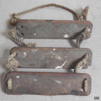 Rope is threaded and knotted through the steps