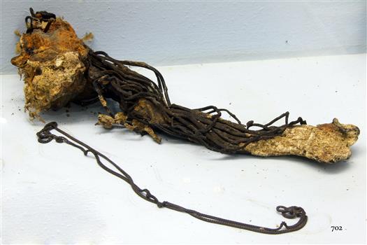 PRIVATE Watch chains, corroded, in a concretion of matter. 