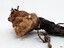 Conglomeration includes corroded chains, sand and other matter