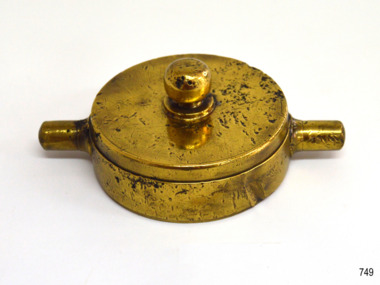 Handles have been ;joined into the base and the sphere was inserted into the top surface