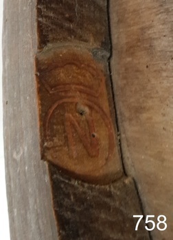 Stamp is a crown above a circle that encloses an 'N'