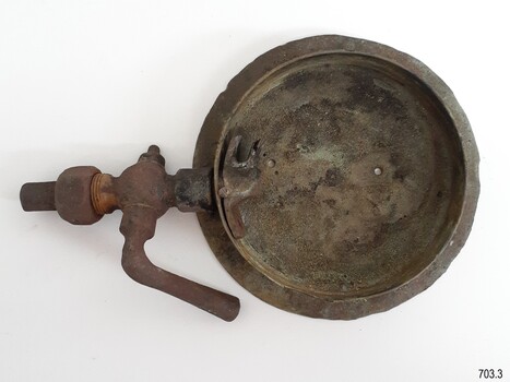 Gauge base has a flat plate with drilled holes