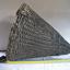 Woven cane cone, painted black, with a vertical metal rod through the centre.