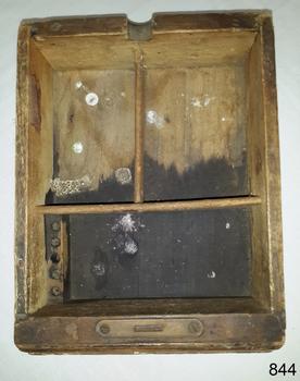 Drawer has fitted compartments and locking mechanics