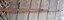 Sheath around seven of the eight sides of shaft, slot at the end and metal sheath around the end