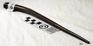 Spike has bulbous handle tapering to a rounded point at the other end