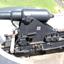 Large iron cannon on metal gun carriage