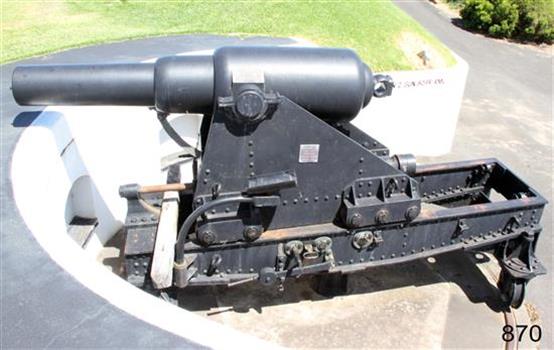Large iron cannon on metal gun carriage
