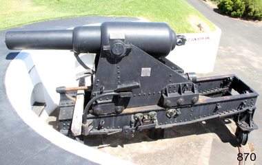 Large iron cannon on metal gun carriage