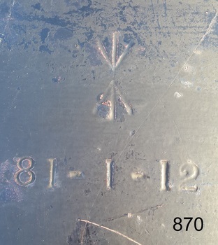 The cannon's certified weight is stamped onto a metal plate
